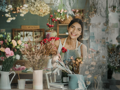 woman clerk in flower shop